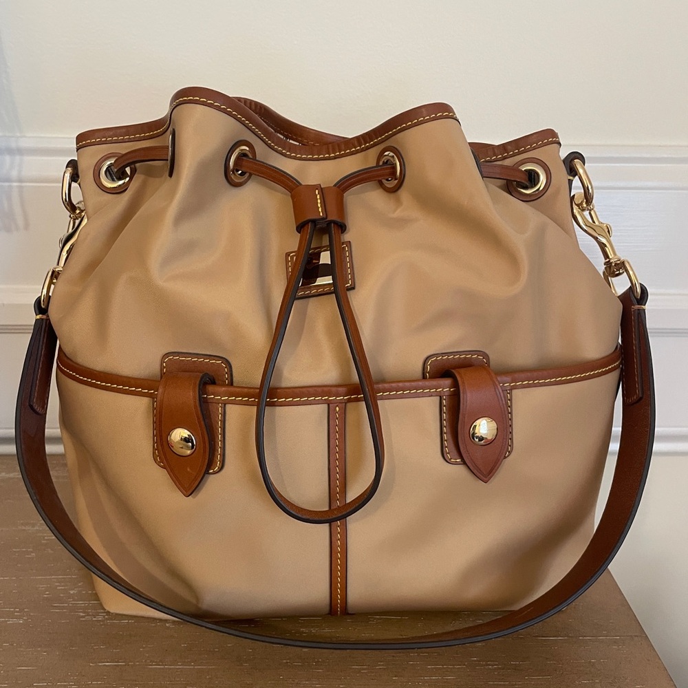 New Never used Dooney and Bourke Large Drawstring bag Perfect to hold IT ALL!